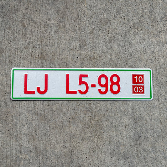 Photo of a 2003 Slovenia Export License Plate Auto Tag Garage Decor Vintage LJ L5 98 with original patina