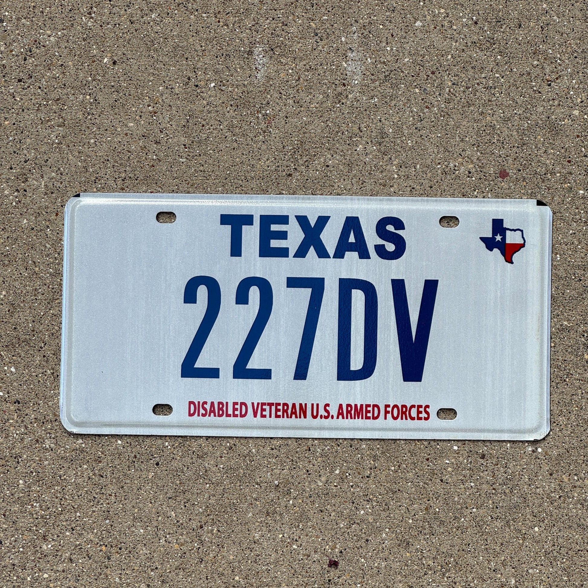 Photo of a 2003 Texas Disabled Veteran License Plate Auto Tag 1 Garage Decor Military 227 DV