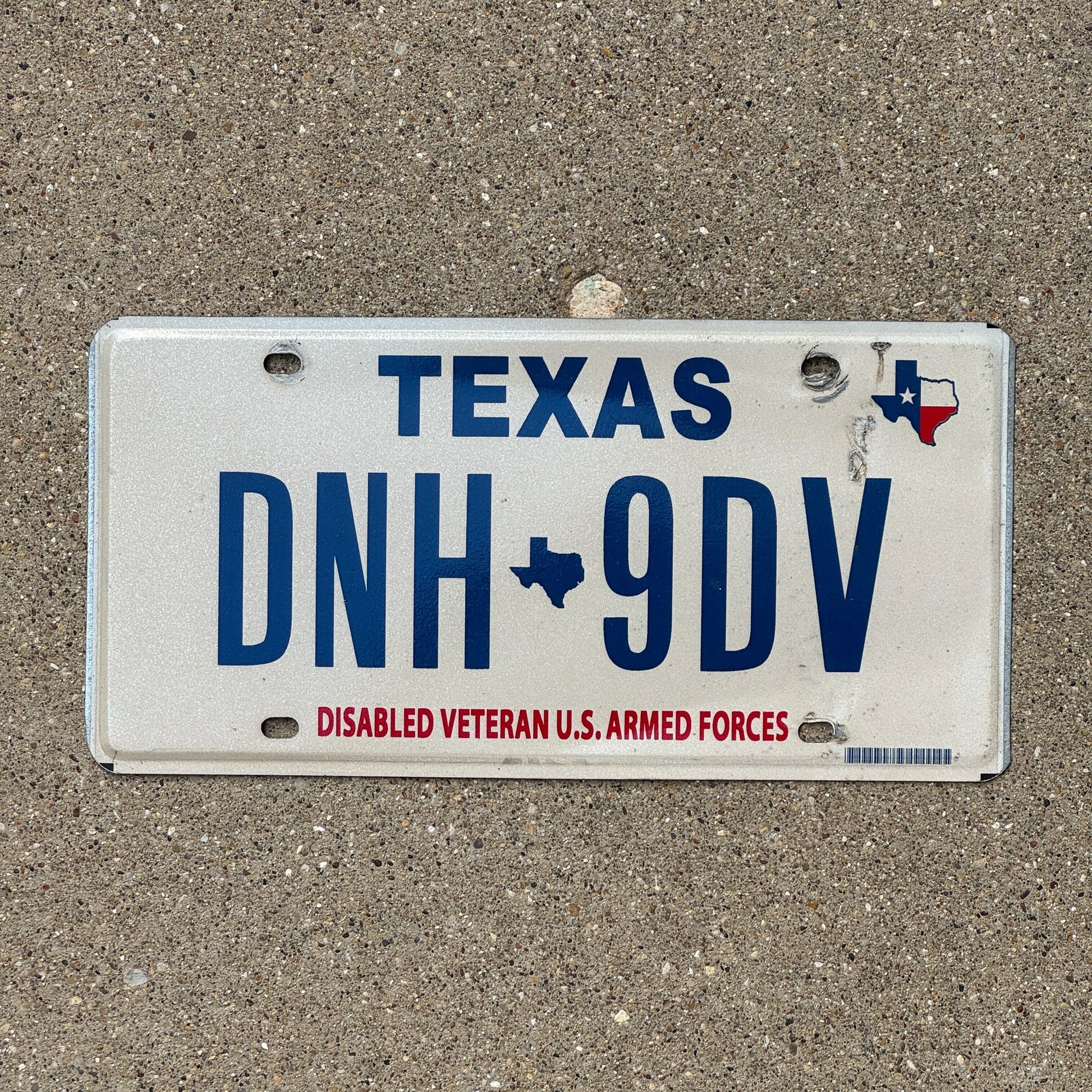 Photo of a 2003 Texas Disabled Veteran License Plate Auto Tag Garage Decor Vintage Military DNH 9DV
