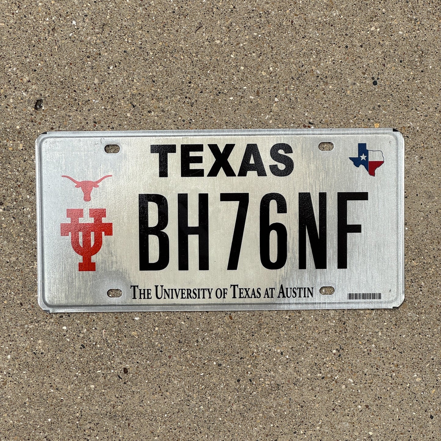 Photo of a 2003 Texas Graphic / Specialty License Plate Auto Tag Garage Decor Vintage University of Texas UT Austin BH 76 NF