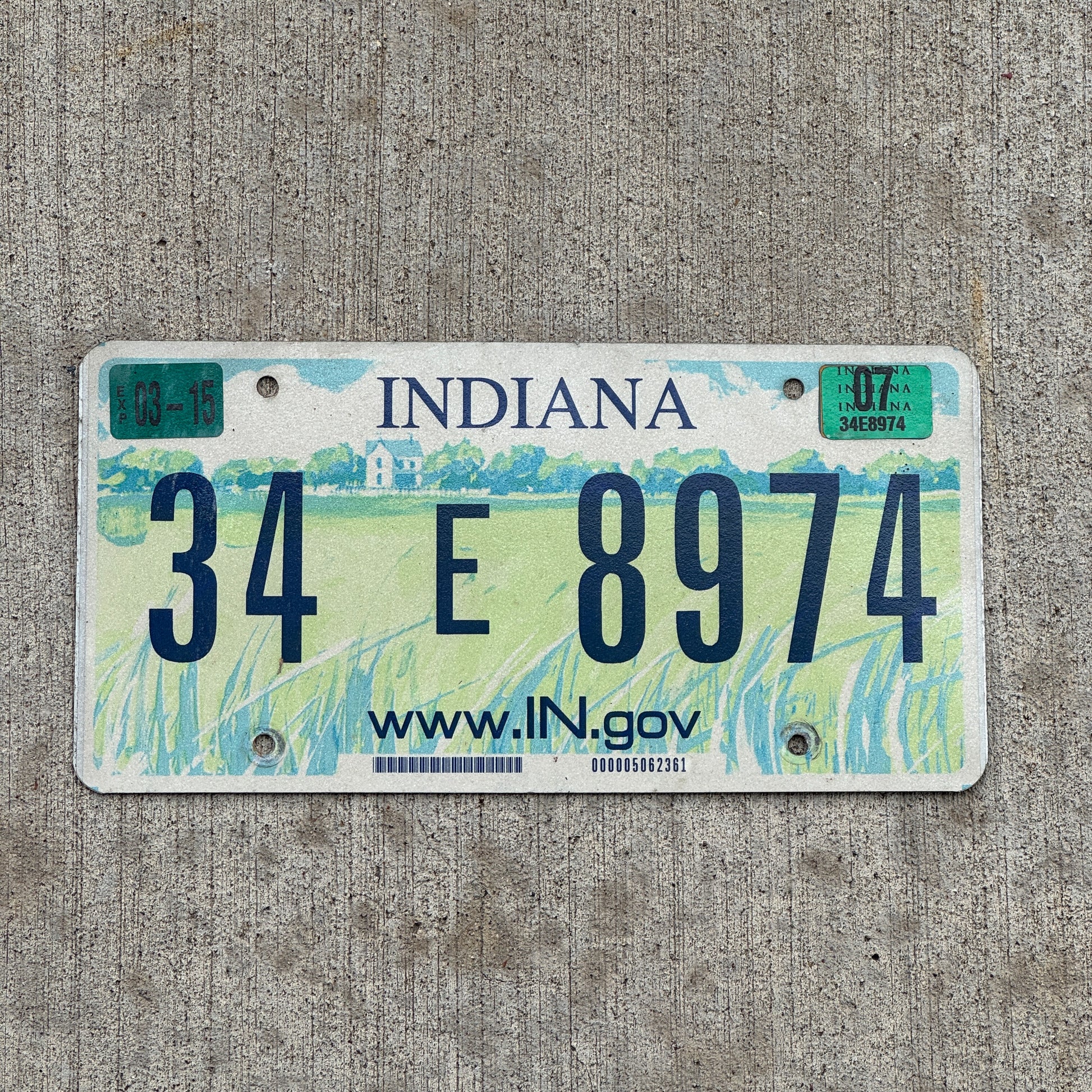 Photo of a 2004 2007 Indiana License Plate Auto Tag Garage Decor Vintage 34 E 8974 with original patina