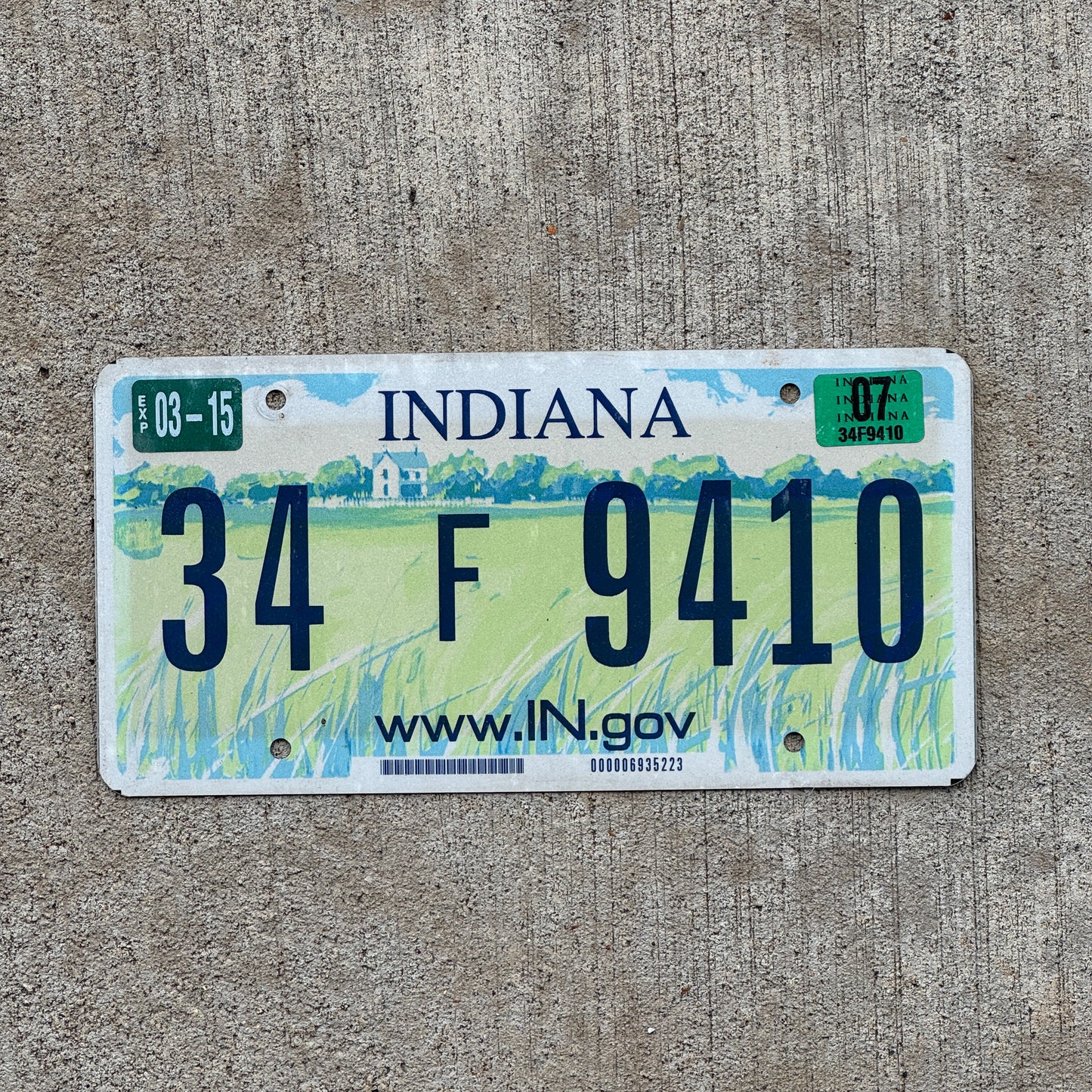 Photo of a 2004 2007 Indiana License Plate Auto Tag Garage Decor Vintage 34 F 9410 with original patina