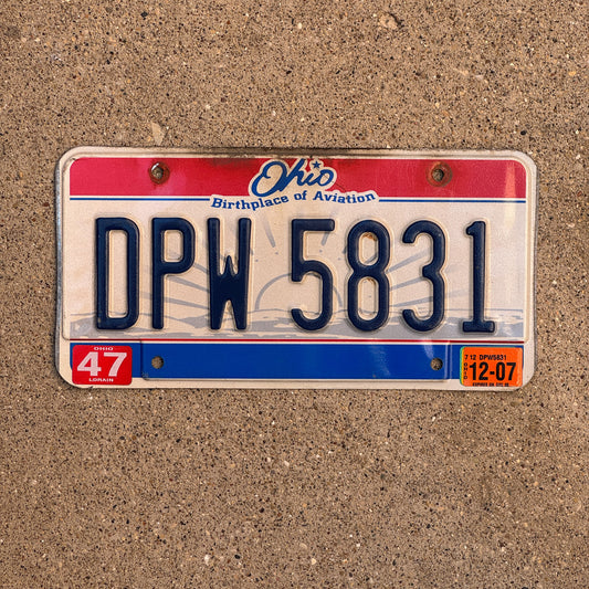 Photo of a 2004 2007 Ohio License Plate Auto Tag 1 Vintage Garage DPW 5831 with original patina