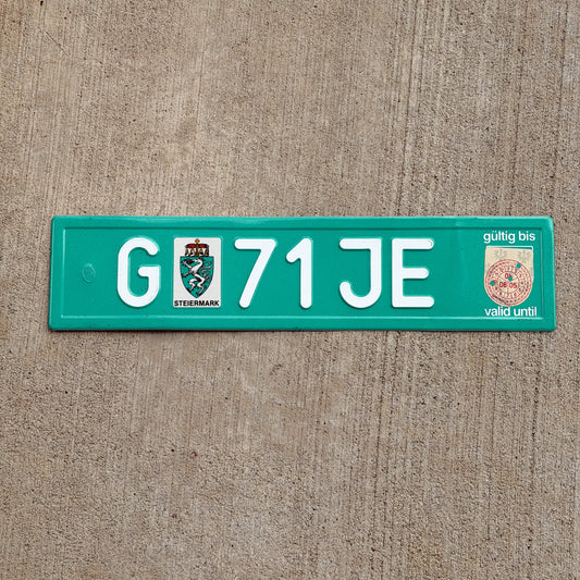Photo of a 2004 Austria Temporary License Plate Auto Tag Garage Decor Vintage Steiermark G 71 JE with original patina