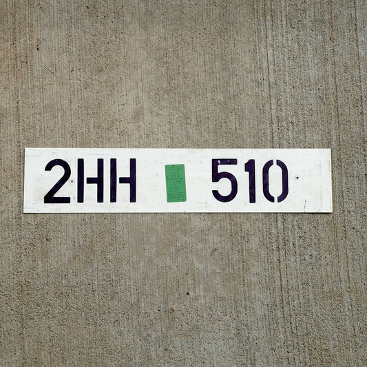 Photo of a 2004 Netherlands Export License Plate Auto Tag Garage Decor Vintage 2 HH 510 with original patina