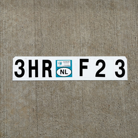 Photo of a 2004 Netherlands Export License Plate Auto Tag Garage Decor Vintage 3 HR F23 with original patina