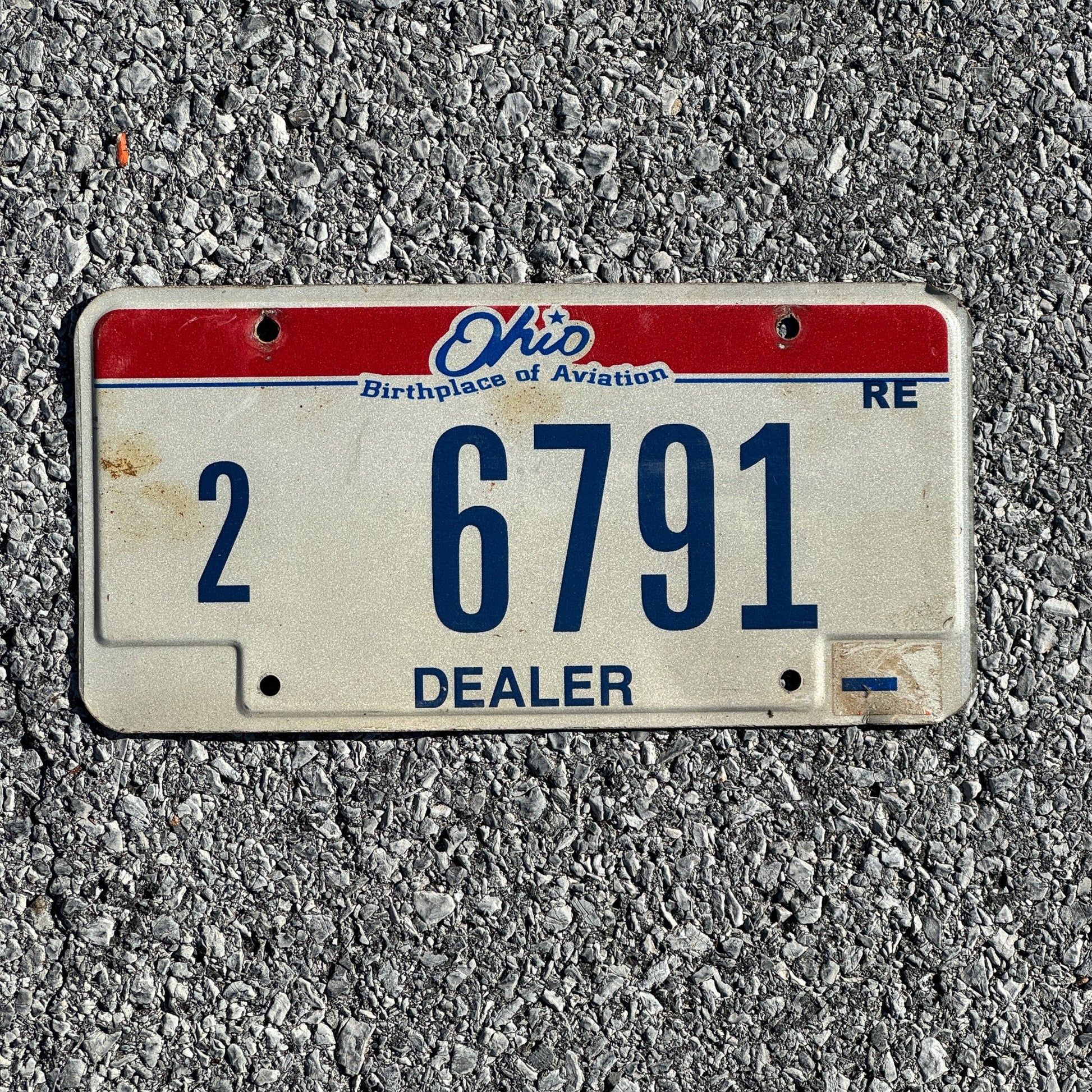 Photo of a 2004 Ohio Dealer Replacement License Plate Auto Tag Garage Decor Vintage 26791