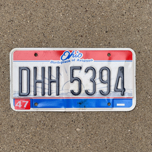 Photo of a 2004 Ohio License Plate Auto Tag Garage Decor Vintage DHH 5394 with original patina