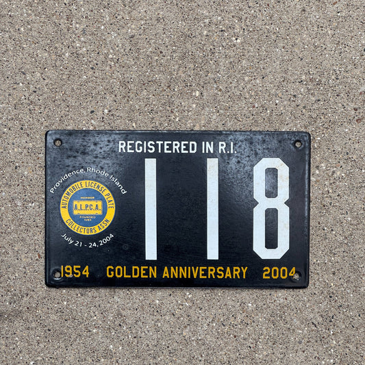 Photo of a 2004 Rhode Island Porcelain License Plate Auto Tag Garage Decor Vintage Providence ALPCA Convention 118