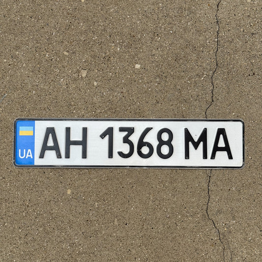 Photo of a 2004 Ukraine License Plate Auto Tag Garage Decor Vintage Donetsk - Russian Controlled AH 1368 MA