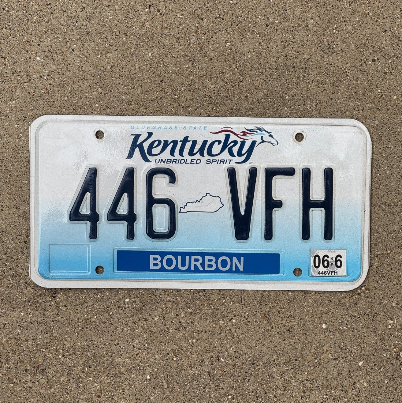 Photo of a 2005 2006 Kentucky License Plate Auto Tag Garage Decor Vintage Bourbon County Bar Decor 446 VFH with original patina
