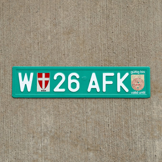 Photo of a 2005 Austria Temporary License Plate Auto Tag Garage Decor Vintage Wien W 26 AFK with original patina
