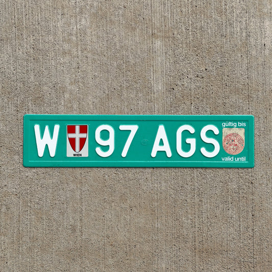 Photo of a 2005 Austria Temporary License Plate Auto Tag Garage Decor Vintage Wien W 97 AGS with original patina