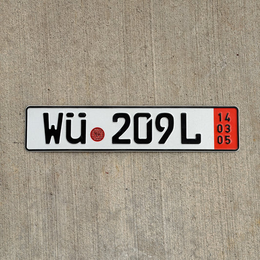 Photo of a 2005 Germany Export License Plate Auto Tag Garage Decor Vintage WU 209 L with original patina