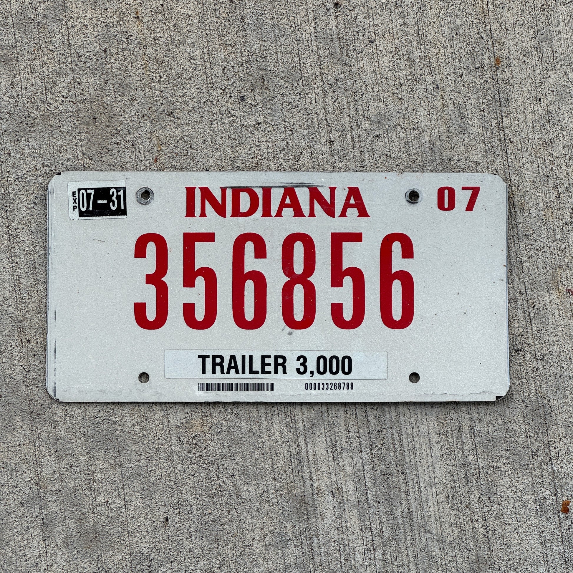 Photo of a 2006 2007 Indiana Trailer License Plate Auto Tag Garage Decor Vintage 356856 with original patina