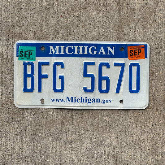 Photo of a 2006 2008 Michigan License Plate Auto Tag Garage Decor Vintage BFG 5670 with original patina