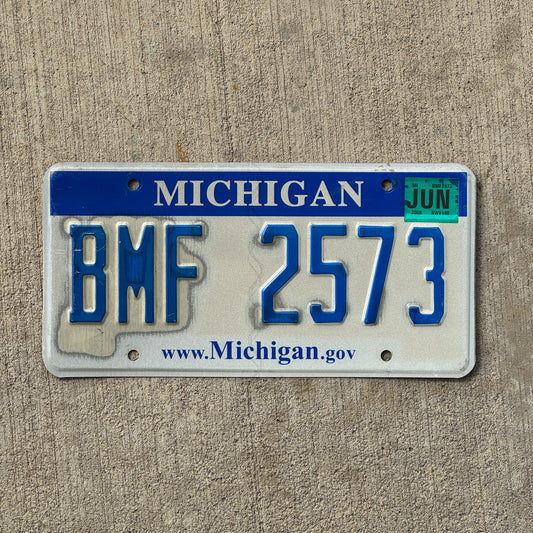 Photo of a 2006 2008 Michigan License Plate Auto Tag Garage Decor Vintage BMF 2573 with original patina