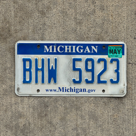 Photo of a 2006 2016 Michigan License Plate Auto Tag Garage Decor Vintage BHW 5923 with original patina