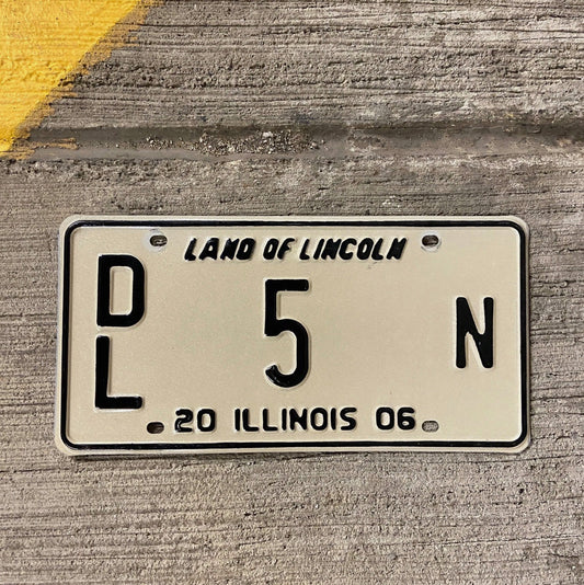 Photo of a 2006 Illinois Dealer License Plate Auto Tag Garage Decor Vintage Single Digit 5 N with original patina