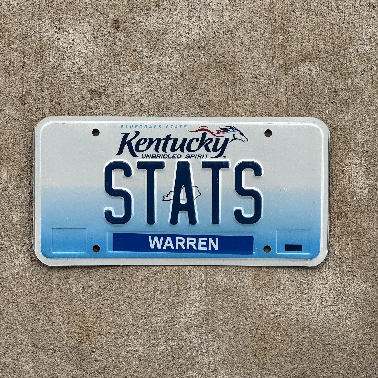 Photo of a 2006 Kentucky Vanity License Plate Auto Tag Garage Decor Vintage Statistics Nerd Gift STATS with original patina