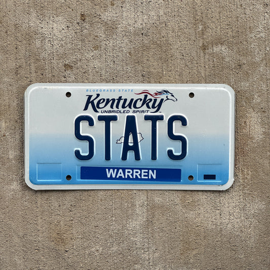 Photo of a 2006 Kentucky Vanity License Plate Auto Tag Garage Decor Vintage Statistics Nerd Gift STATS with original patina