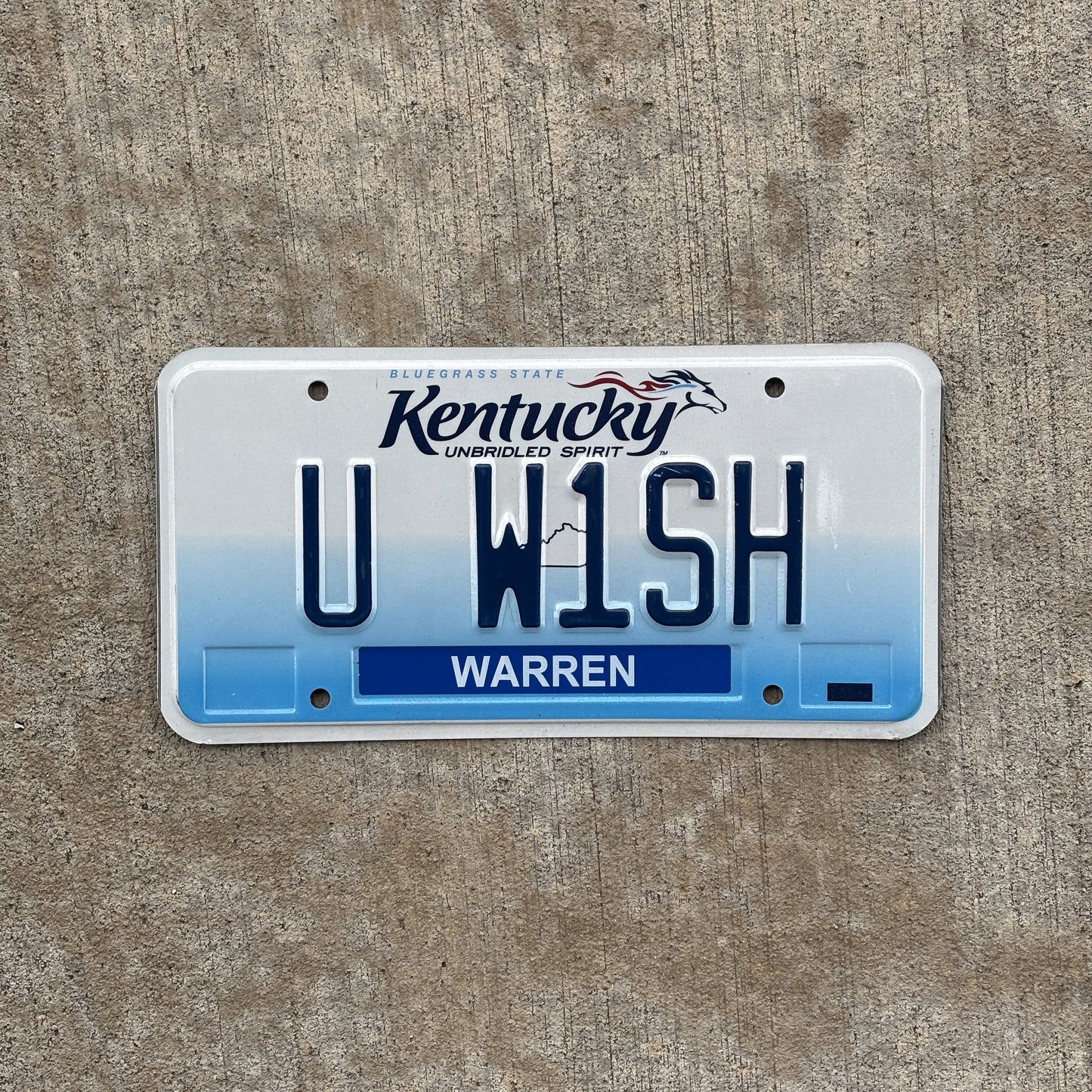 Photo of a 2006 Kentucky Vanity License Plate Auto Tag Garage Decor Vintage You Wish Joke Fun Gag Gift U W1SH with original patina