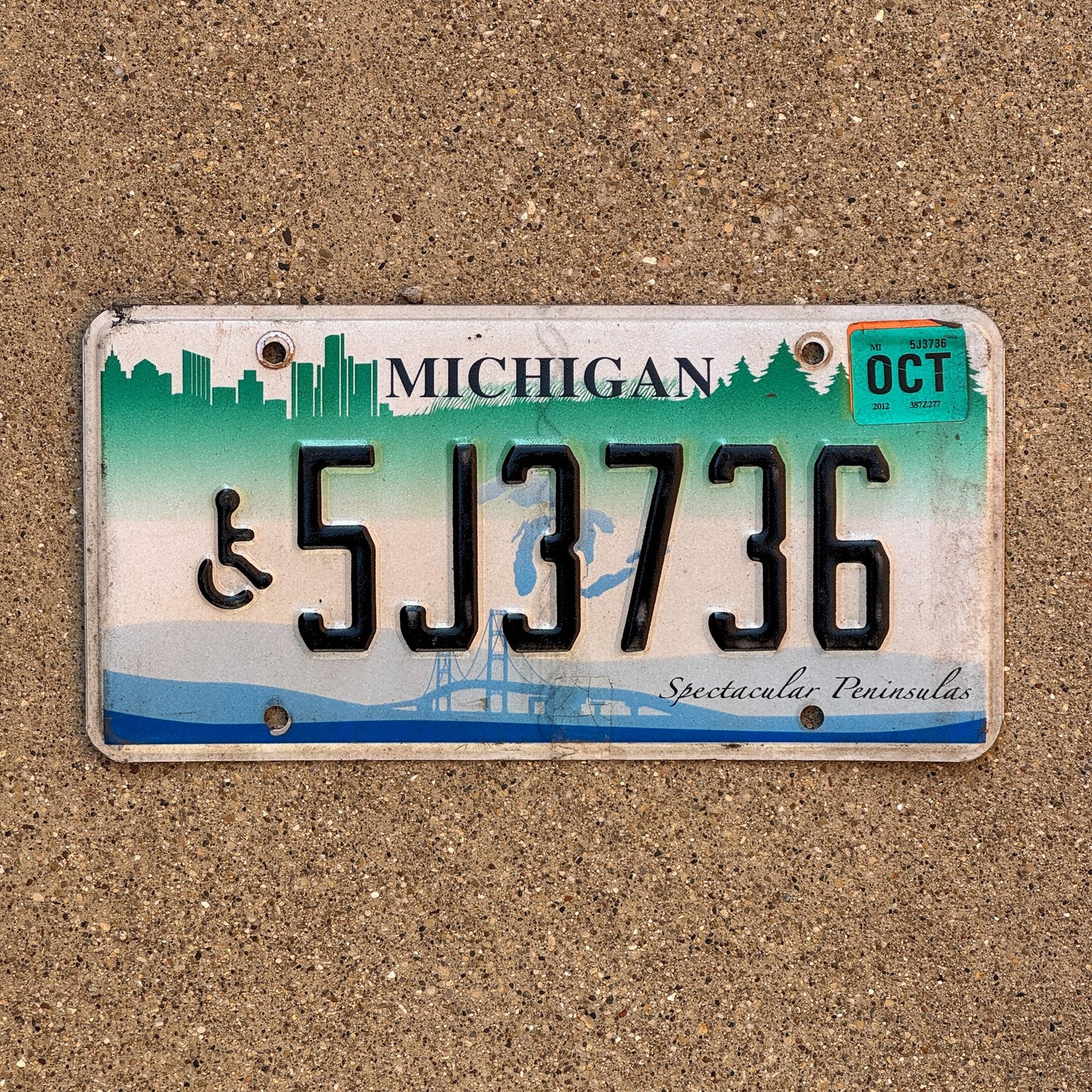 Photo of a 2007 2012 Michigan Handicap License Plate Auto Tag Garage Decor Vintage Graphic / Specialty Spectacular Peninsulas 5J3736