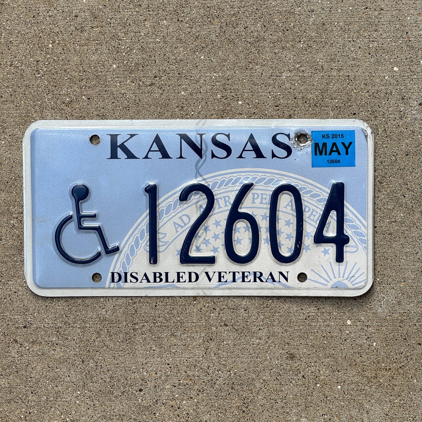 Photo of a 2007 2015 Kansas Disabled Veteran License Plate Auto Tag Garage Decor Vintage Military 12604