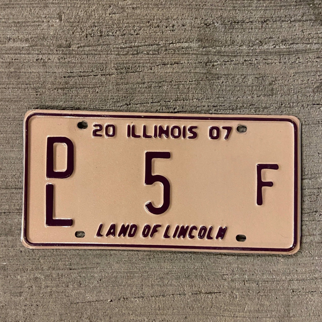 Photo of a 2007 Illinois Dealer License Plate Auto Tag Garage Decor Vintage Single Digit 5 F with original patina