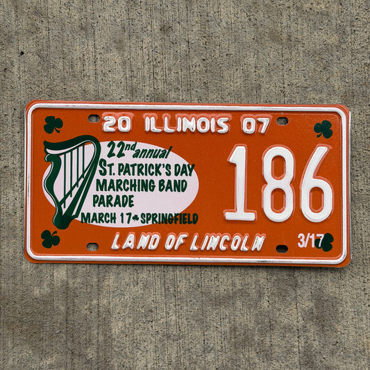 Photo of a 2007 Illinois Event License Plate Auto Tag Garage Decor Vintage St. Patrick's Day Marching Band Parade Springfield 186 with original patina