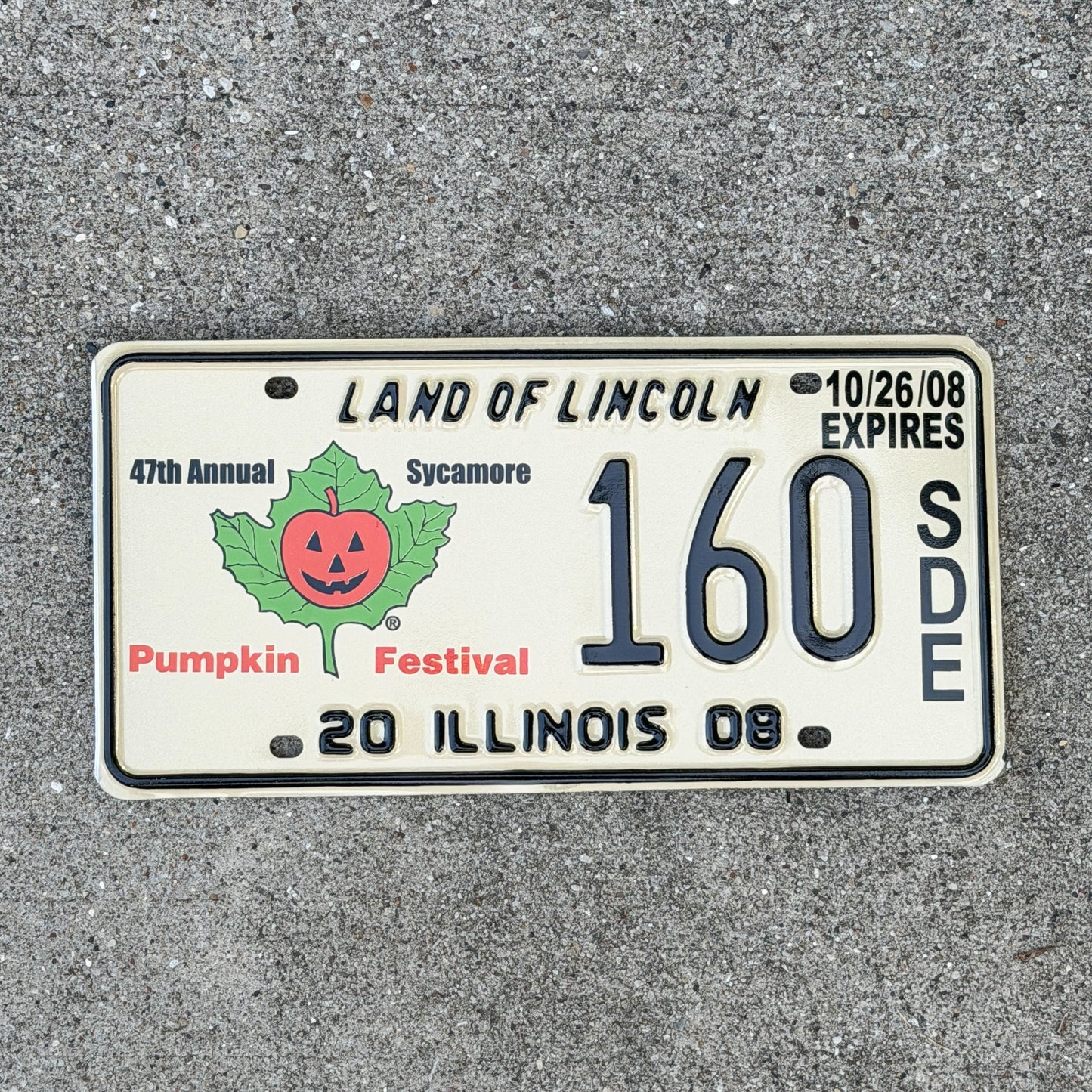 Photo of a 2008 Illinois Event License Plate Auto Tag Garage Decor Vintage Sycamore Pumpkin Festival Halloween 160 with original patina