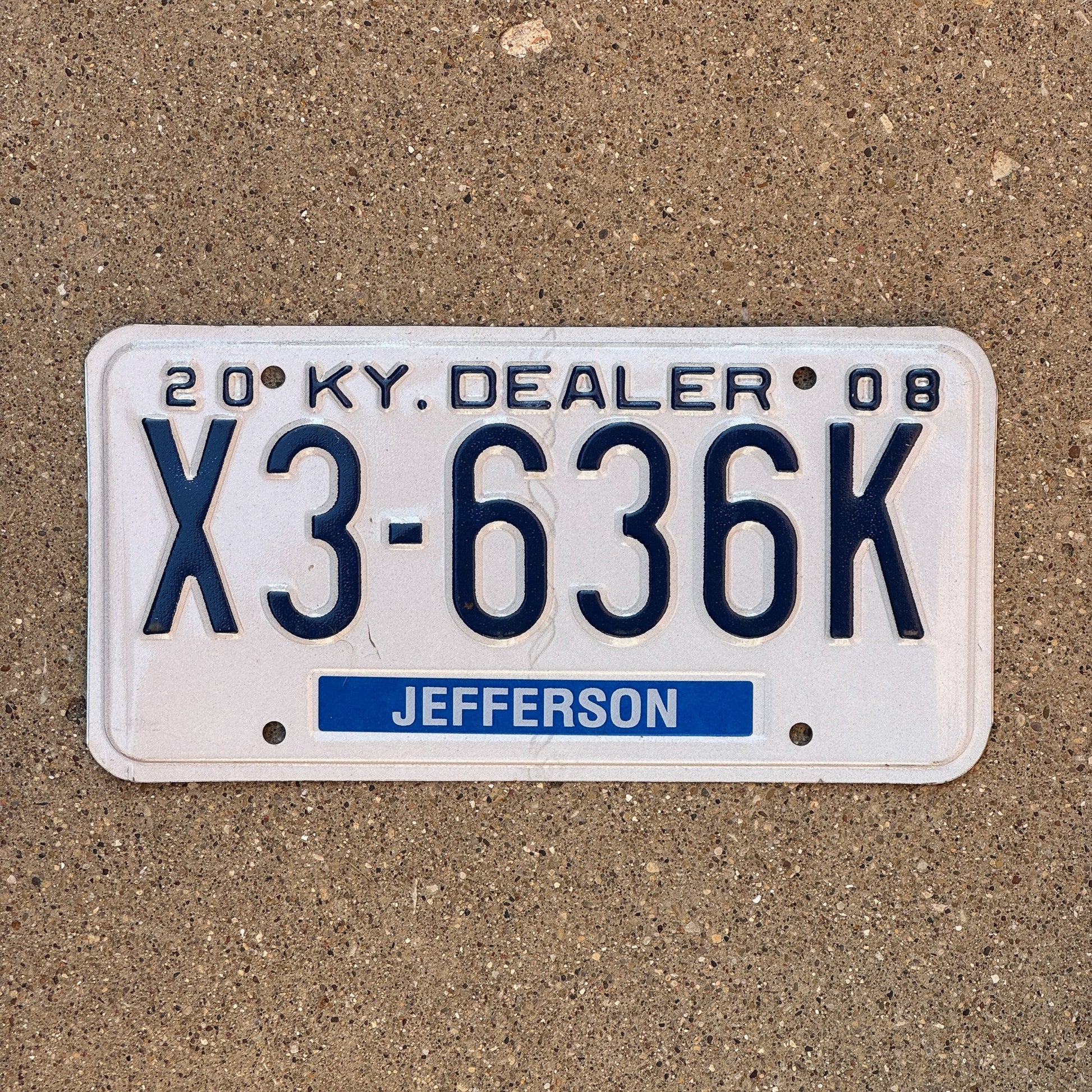 Photo of a 2008 Kentucky Dealer License Plate Auto Tag Garage Decor Vintage Jefferson County X3 636K