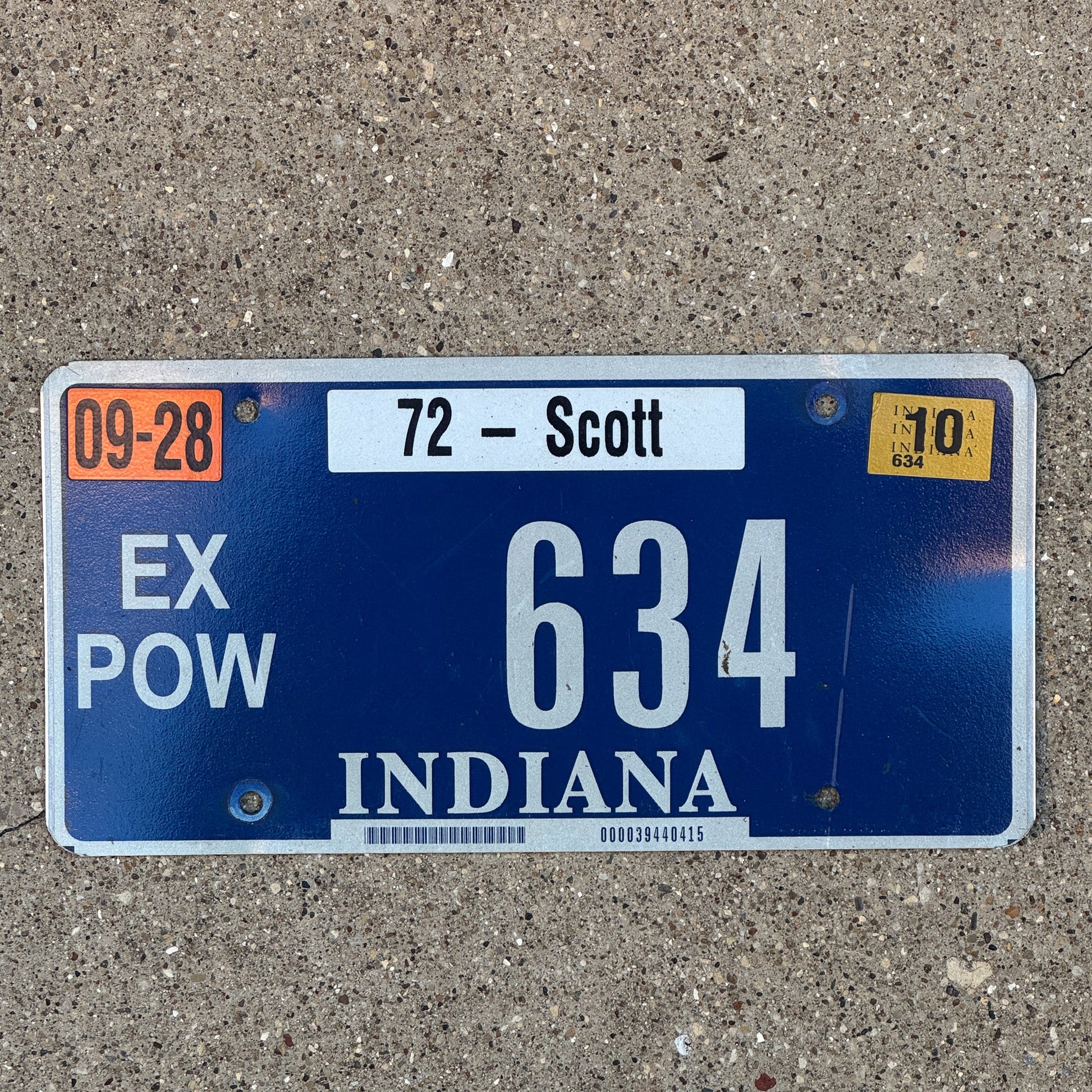 Photo of a 2009 2010 Indiana Ex Prisoner of War License Plate Auto Tag Garage Decor Vintage POW 634 with original patina