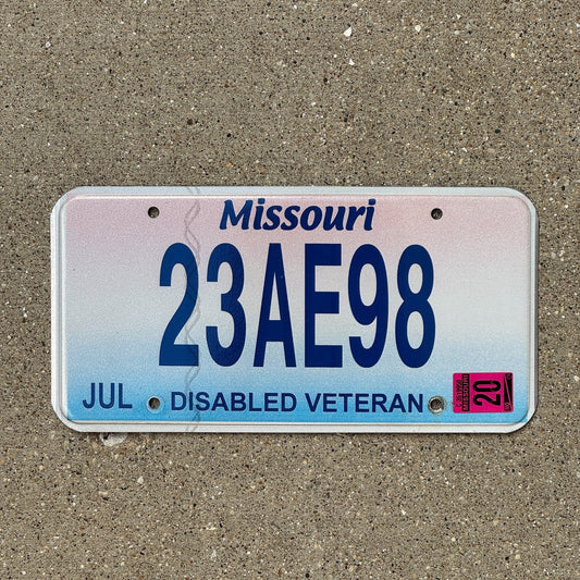Photo of a 2009 2020 Missouri Disabled Veteran License Plate Auto Tag 2 Garage Decor 23 AE 98