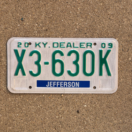 Photo of a 2009 Kentucky Dealer License Plate Auto Tag Garage Decor Vintage Jefferson County X3 630K