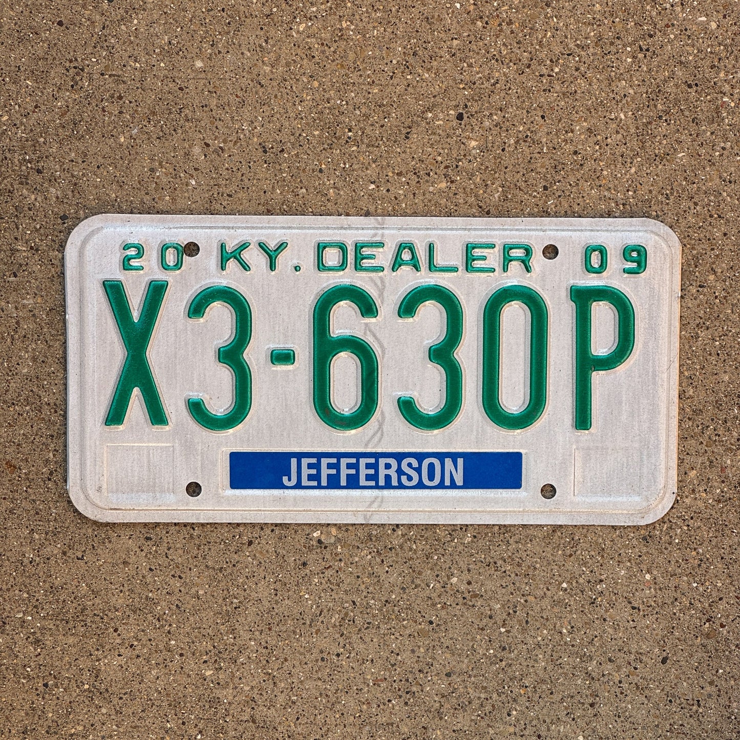 Photo of a 2009 Kentucky Dealer License Plate Auto Tag Garage Decor Vintage Jefferson County X3 630P