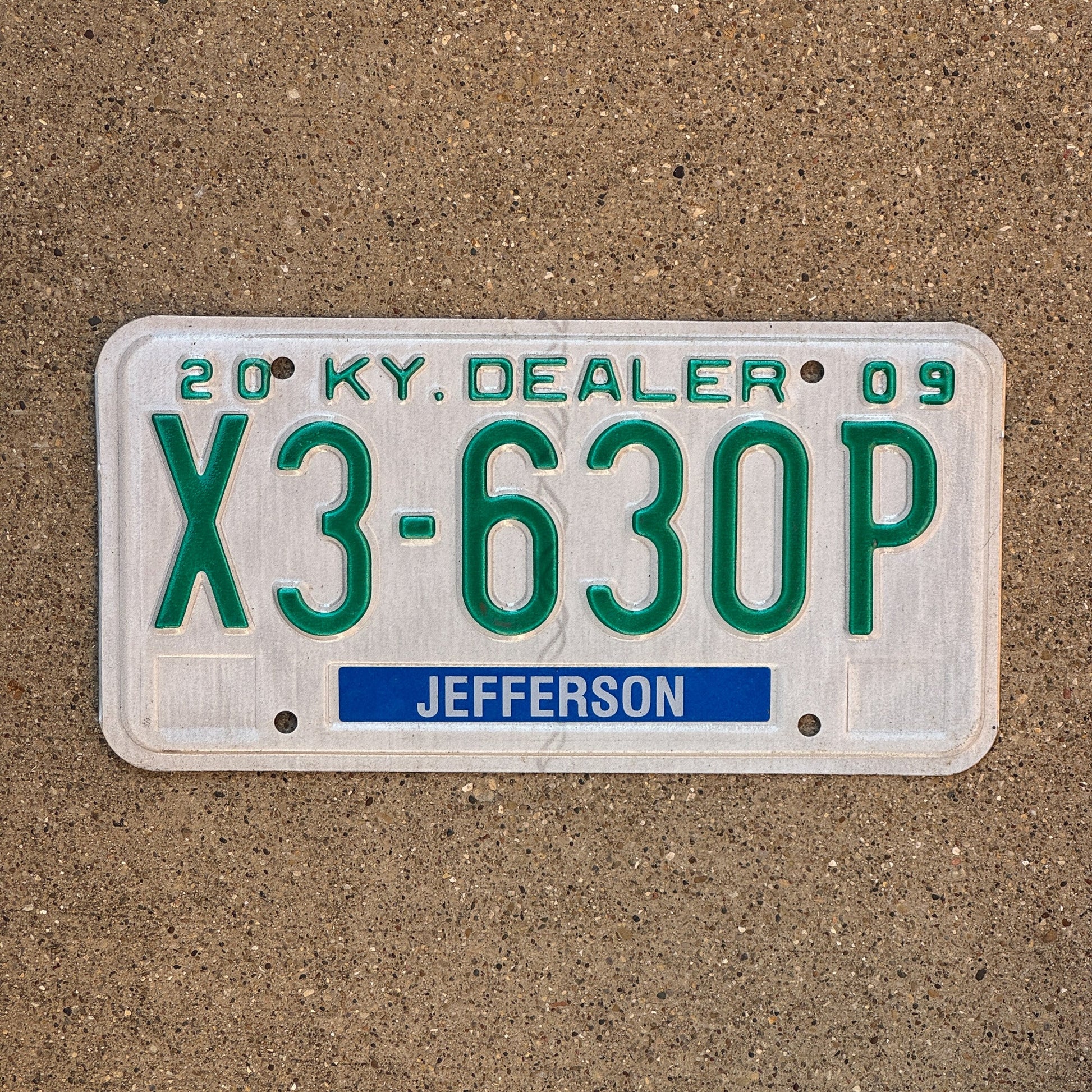 Photo of a 2009 Kentucky Dealer License Plate Auto Tag Garage Decor Vintage Jefferson County X3 630P