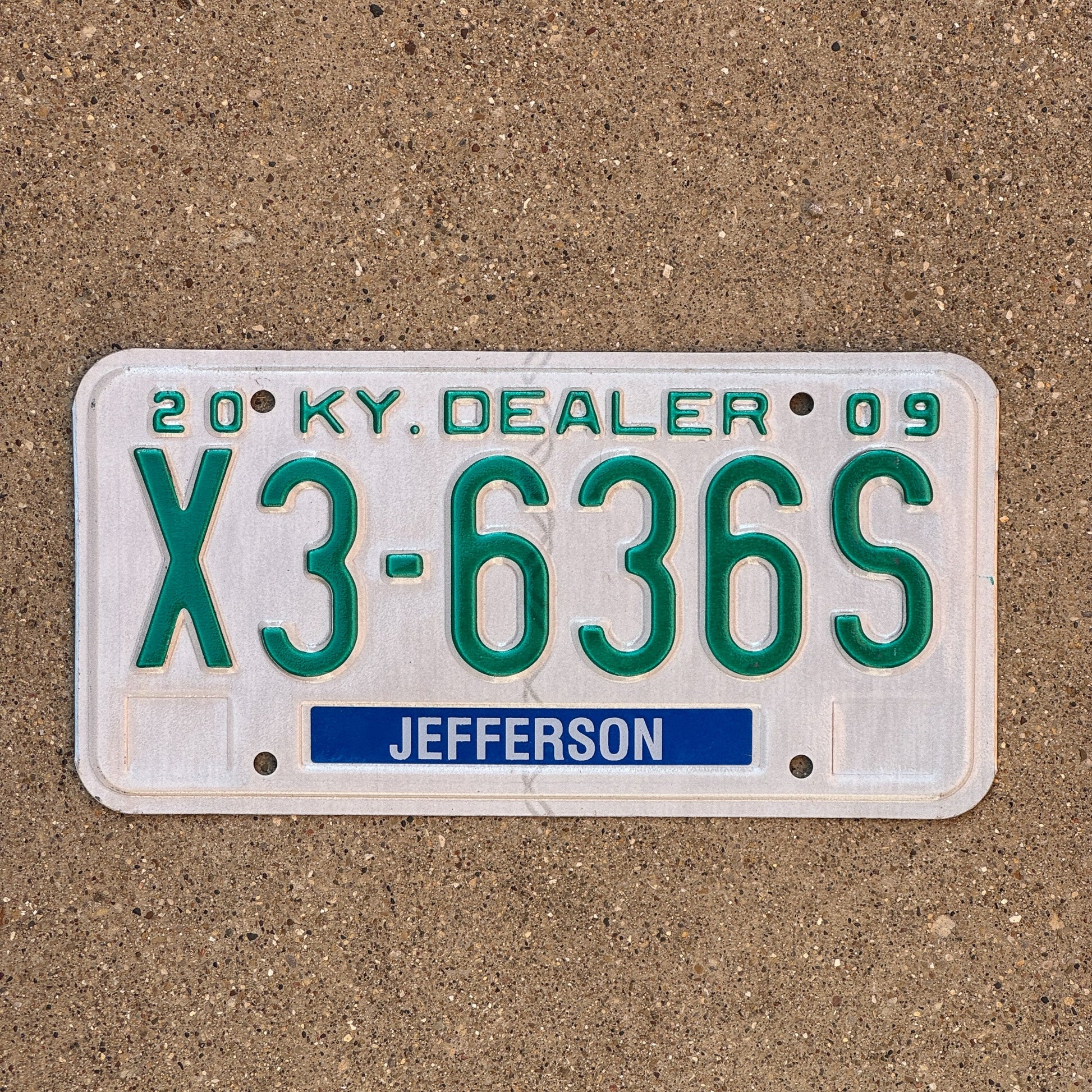 Photo of a 2009 Kentucky Dealer License Plate Auto Tag Garage Decor Vintage Jefferson County X3 636S