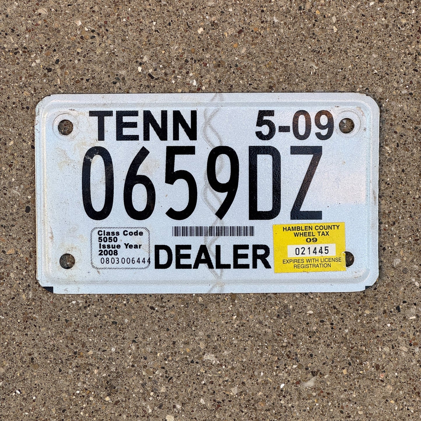 Photo of a 2009 Tennessee Motorcycle Dealer License Plate Auto Tag Garage Decor Vintage 0659 DZ with original patina