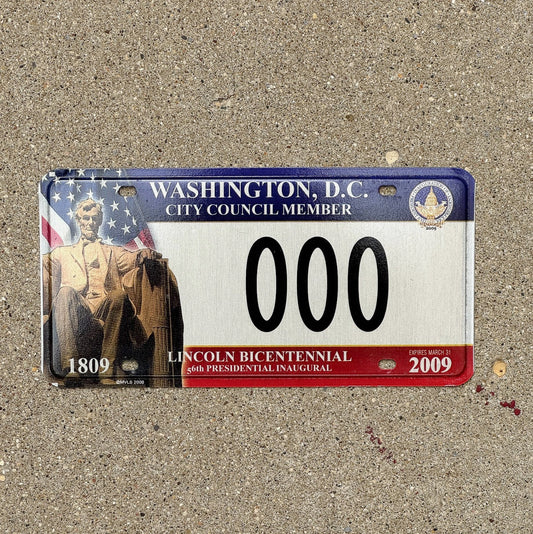 Photo of a 2009 Washington DC Sample License Plate Auto Tag Garage Decor Vintage City Council Member Oddball Type 000 with original patina