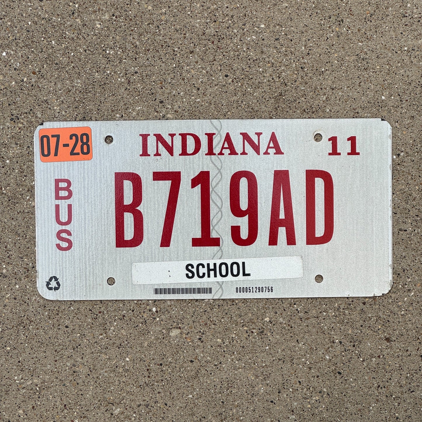 Photo of a 2010 2011 Indiana School Bus License Plate Auto Tag Garage Decor Vintage B 719 AD with original patina