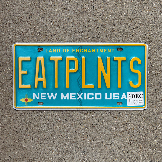 Photo of a 2010 2021 New Mexico Vanity License Plate Auto Tag Garage Decor Vintage Eat Plants Vegetarian Vegan EATPLNTS with original patina