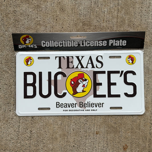 Photo of a 2010 Era BUCEE'S Texas Booster License Plate Auto Tag Garage Decor Vintage
 Beaver Gas Station with original patina