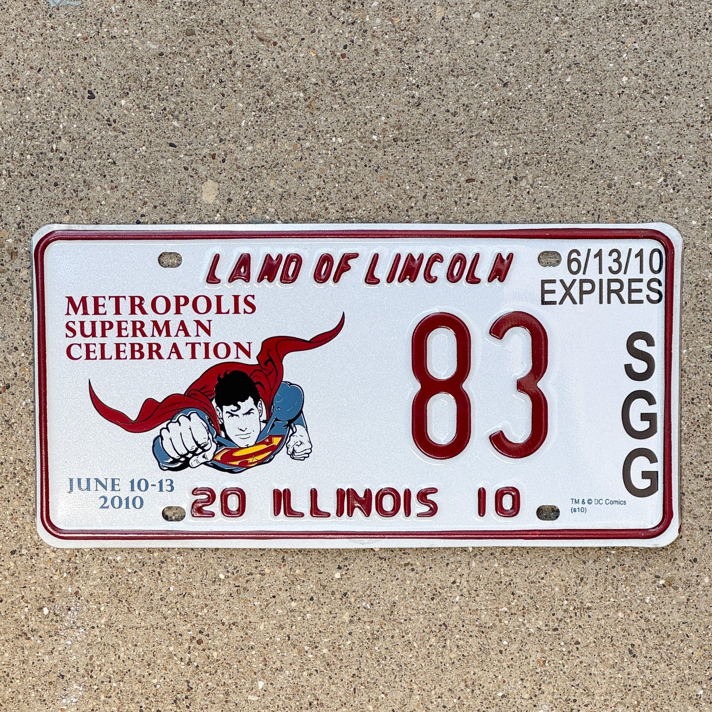 Photo of a 2010 Illinois Event License Plate Auto Tag 1 Garage Decor Metropolis Illinois Superman Comics 83 with original patina