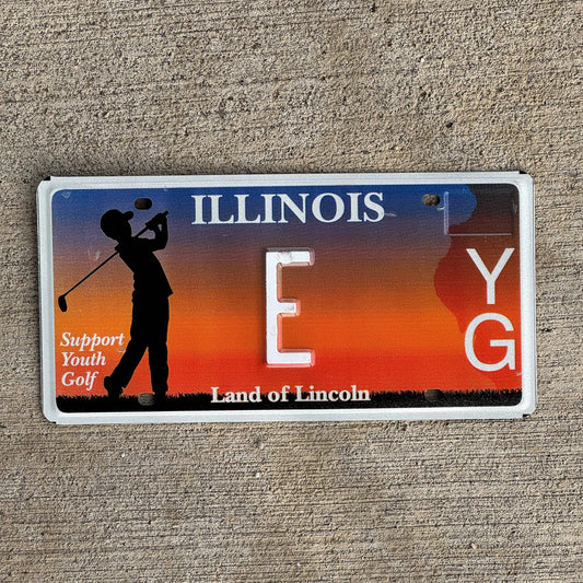 Photo of a 2010 Illinois Graphic / Specialty License Plate Auto Tag Garage Decor Vintage Support Youth Golf Low Number Single Letter E with original patina