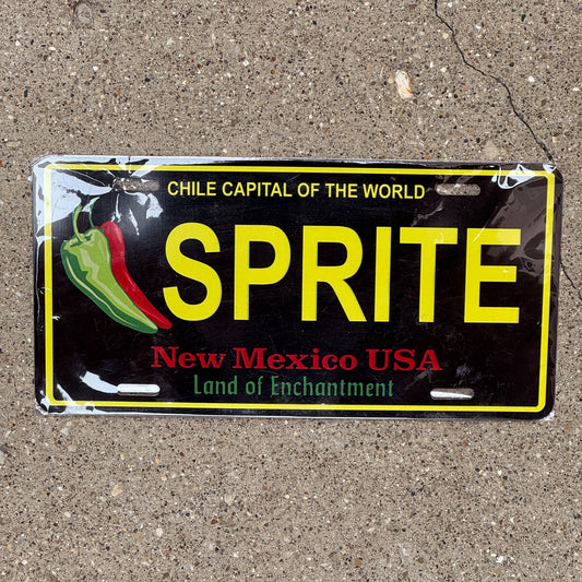 Photo of a 2010s Era New Mexico Souvenir License Plate Auto Tag Garage Decor Vintage Pop Soda Fae Fairy SPRITE
