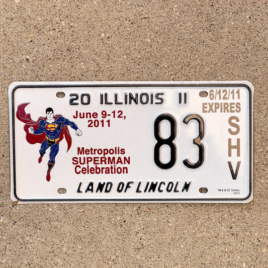 Photo of a 2011 Illinois Event License Plate Auto Tag 2 Garage Decor Metropolis Illinois Superman Comics 83 with original patina