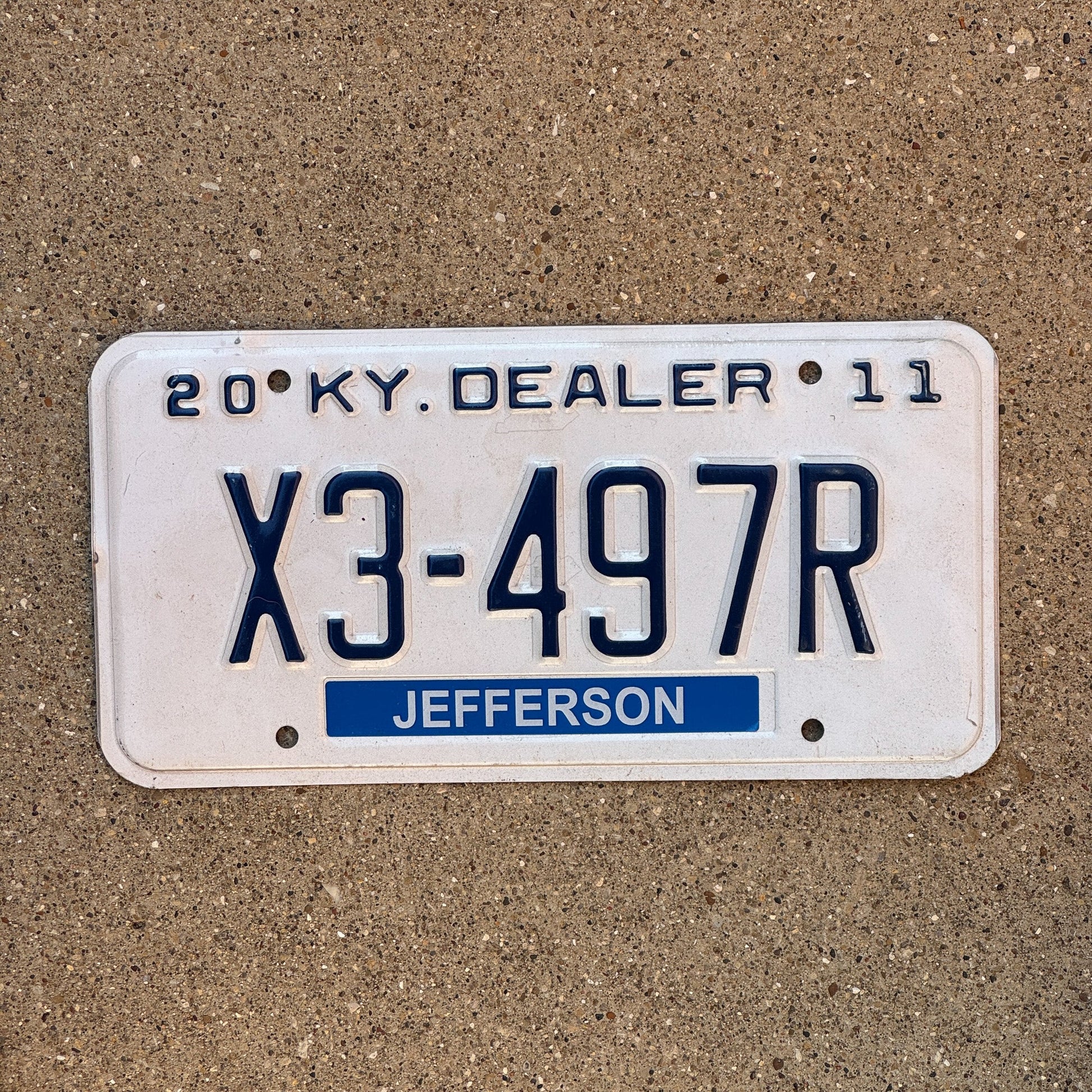 Photo of a 2011 Kentucky Dealer License Plate Auto Tag Garage Decor Vintage Jefferson County X3 497R