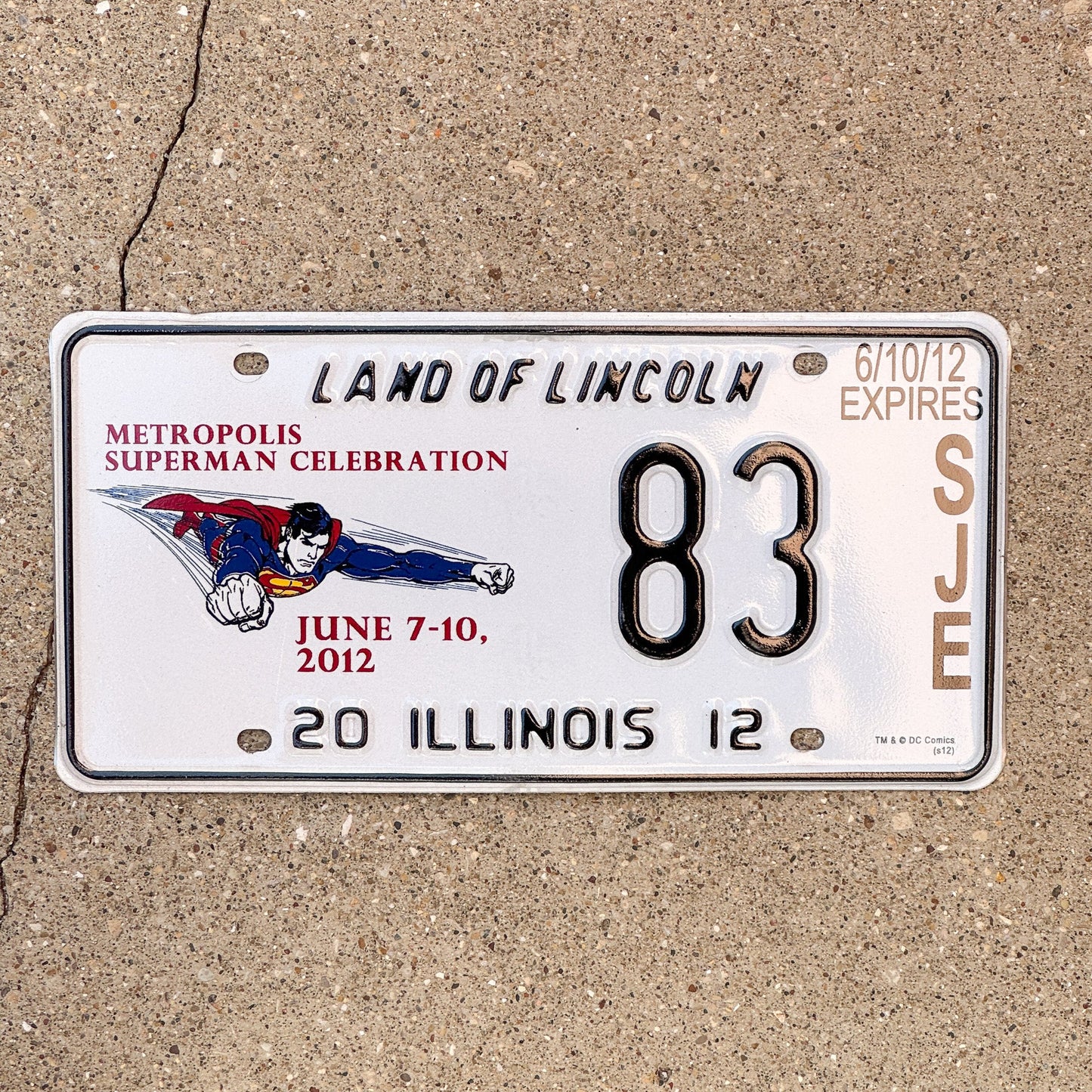 Photo of a 2012 Illinois Event License Plate Auto Tag 2 Garage Decor Metropolis Illinois Superman Comics 83 with original patina