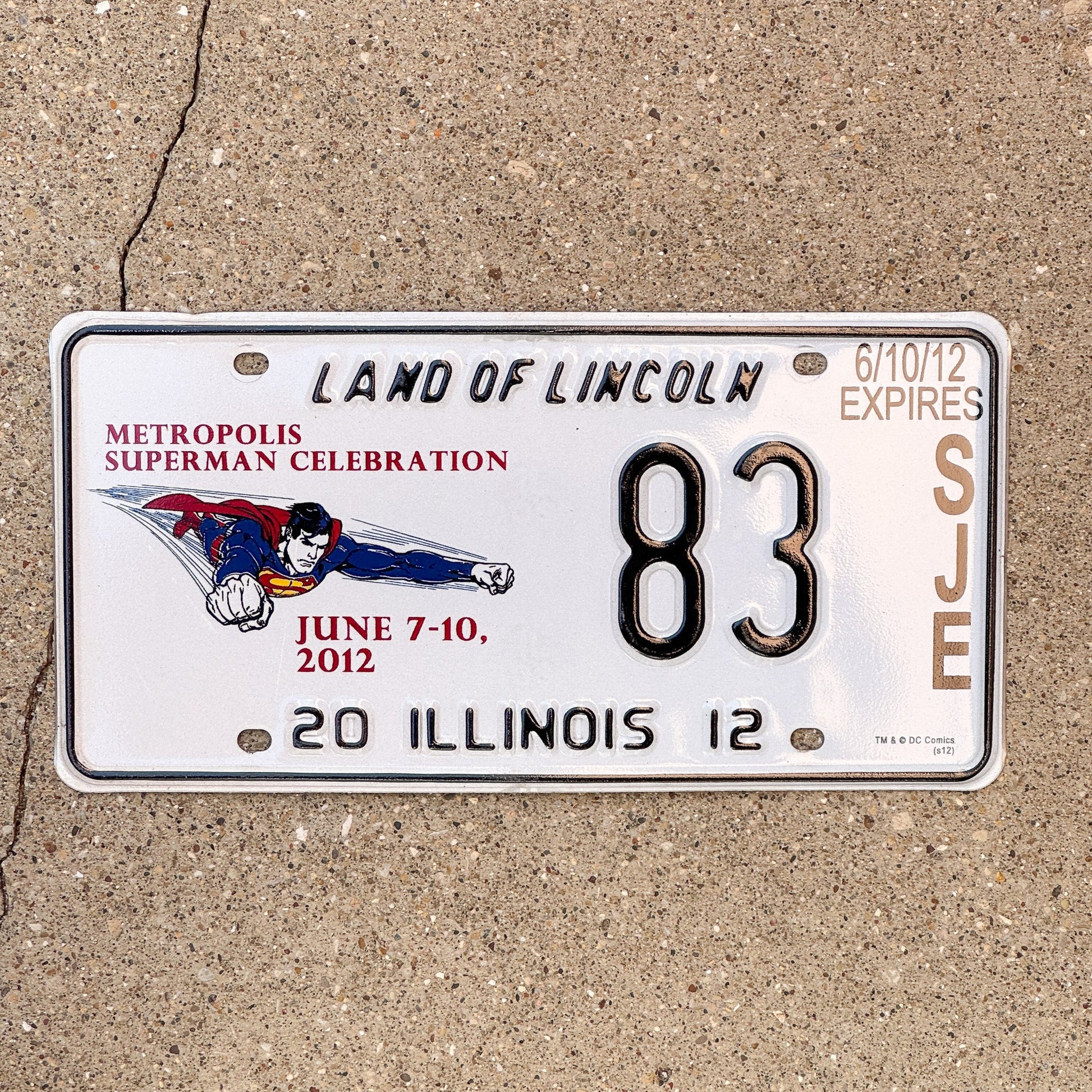 Photo of a 2012 Illinois Event License Plate Auto Tag 2 Garage Decor Metropolis Illinois Superman Comics 83 with original patina